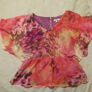 Jennifer Lopez multi-colored top